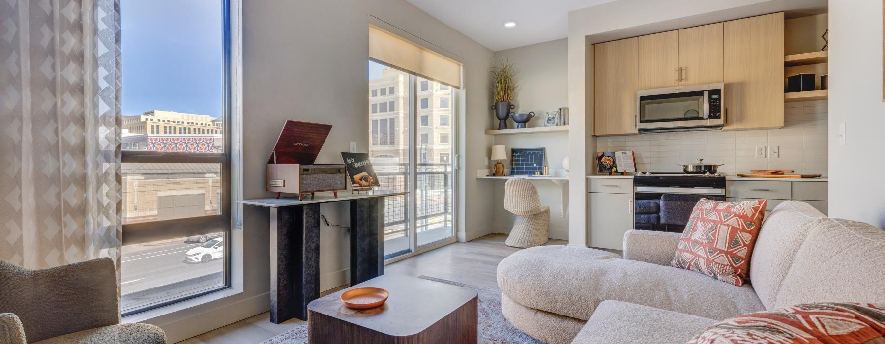 a living room with a couch and a table