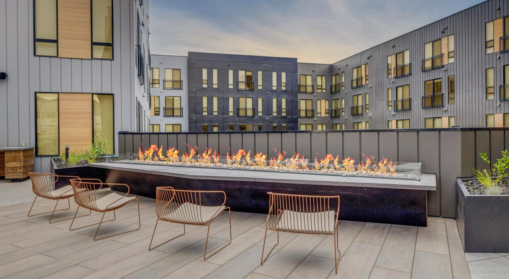a pool with chairs around it
